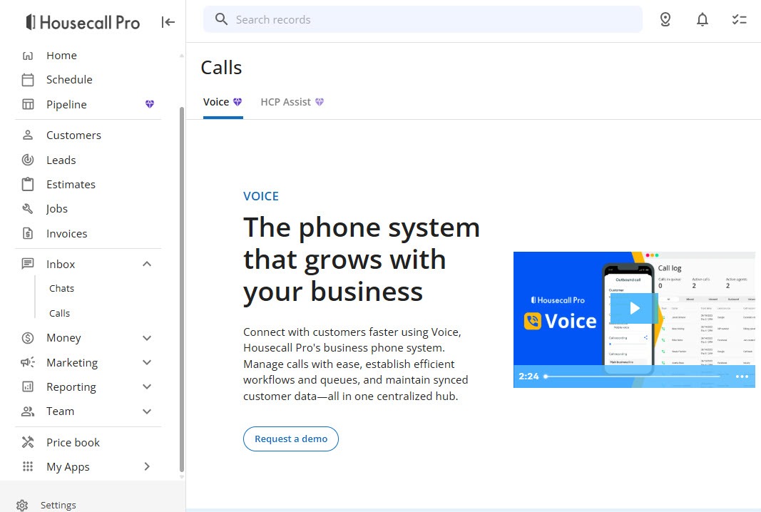 Screenshot of the Housecall Pro Voice page under the Inbox menu, headed The phone system that grows with your business, with a Request a demo button